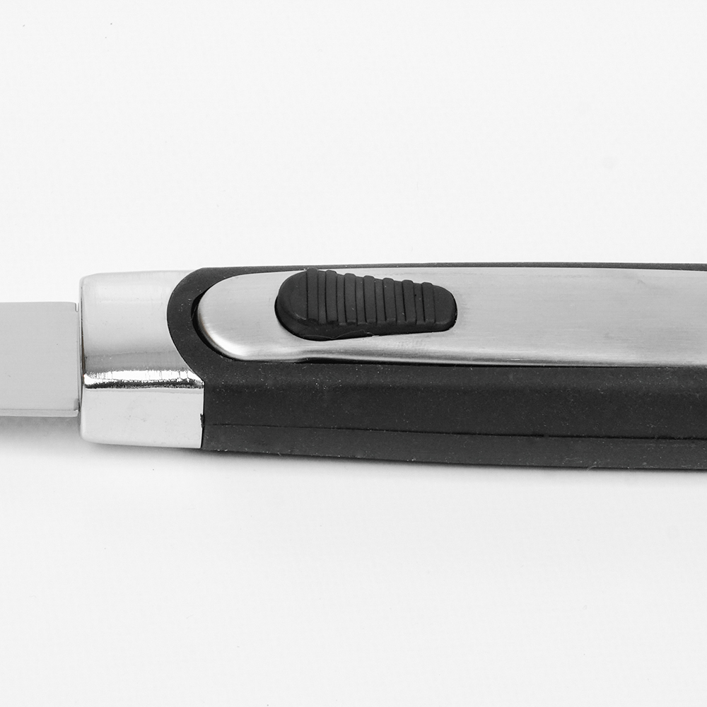 A silver and black cutter with a black button on the handle, close-up on a white background.