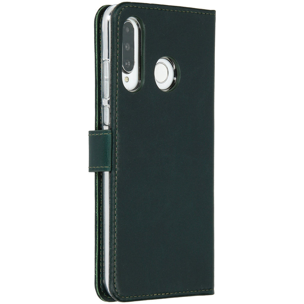 Coque de téléphone vert foncé, vue latérale, avec un téléphone à l'intérieur. La caméra et les boutons sont visibles.