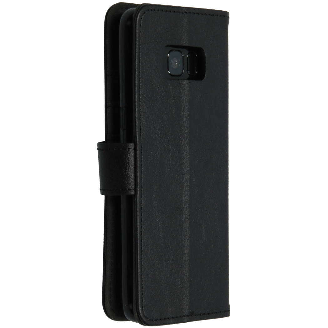 Custodia in pelle nera, con telefono all'interno. Una fotocamera è visibile.