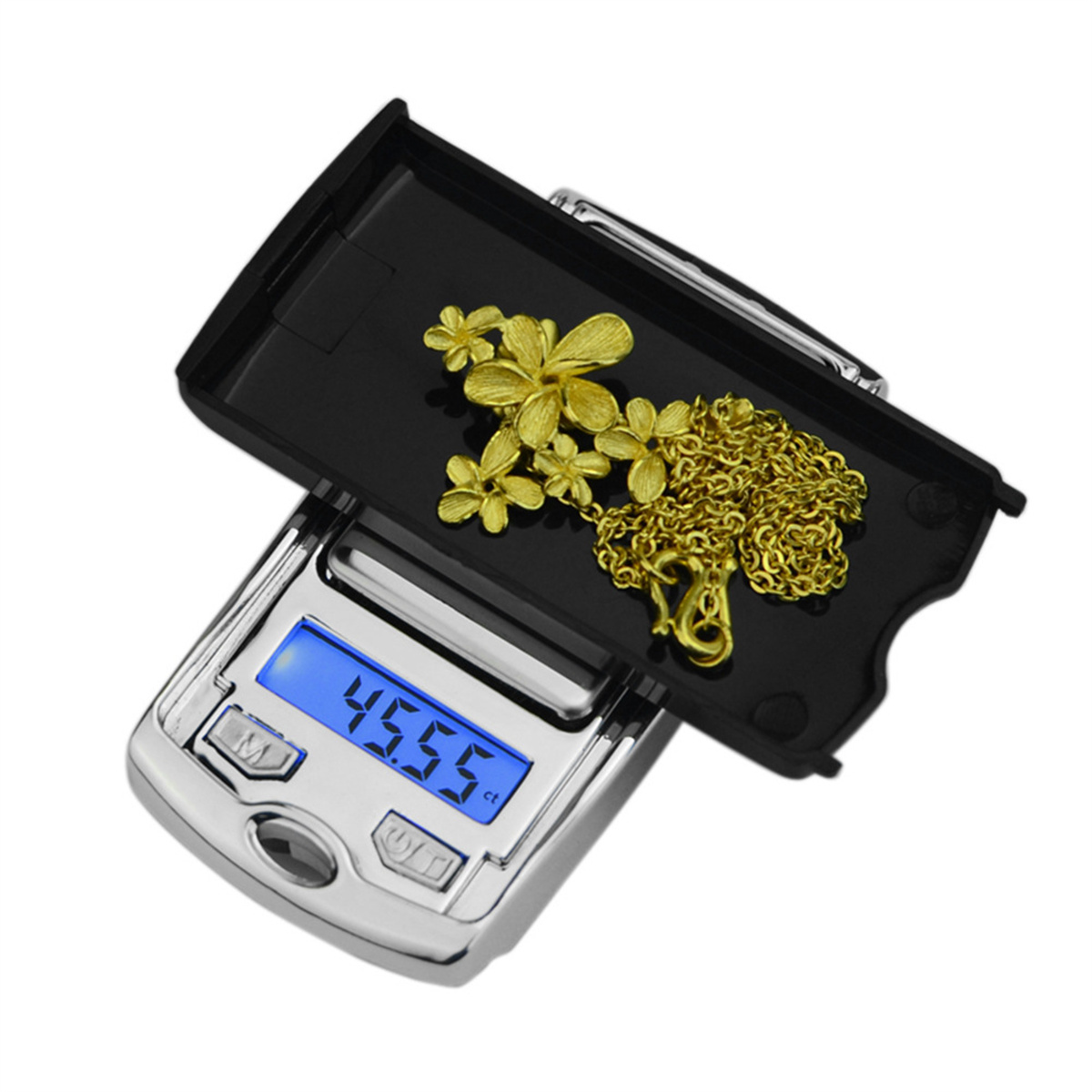 Digitale Waage mit Goldschmuck. Anzeige zeigt 45,55 ct. Schwarze Ablage.