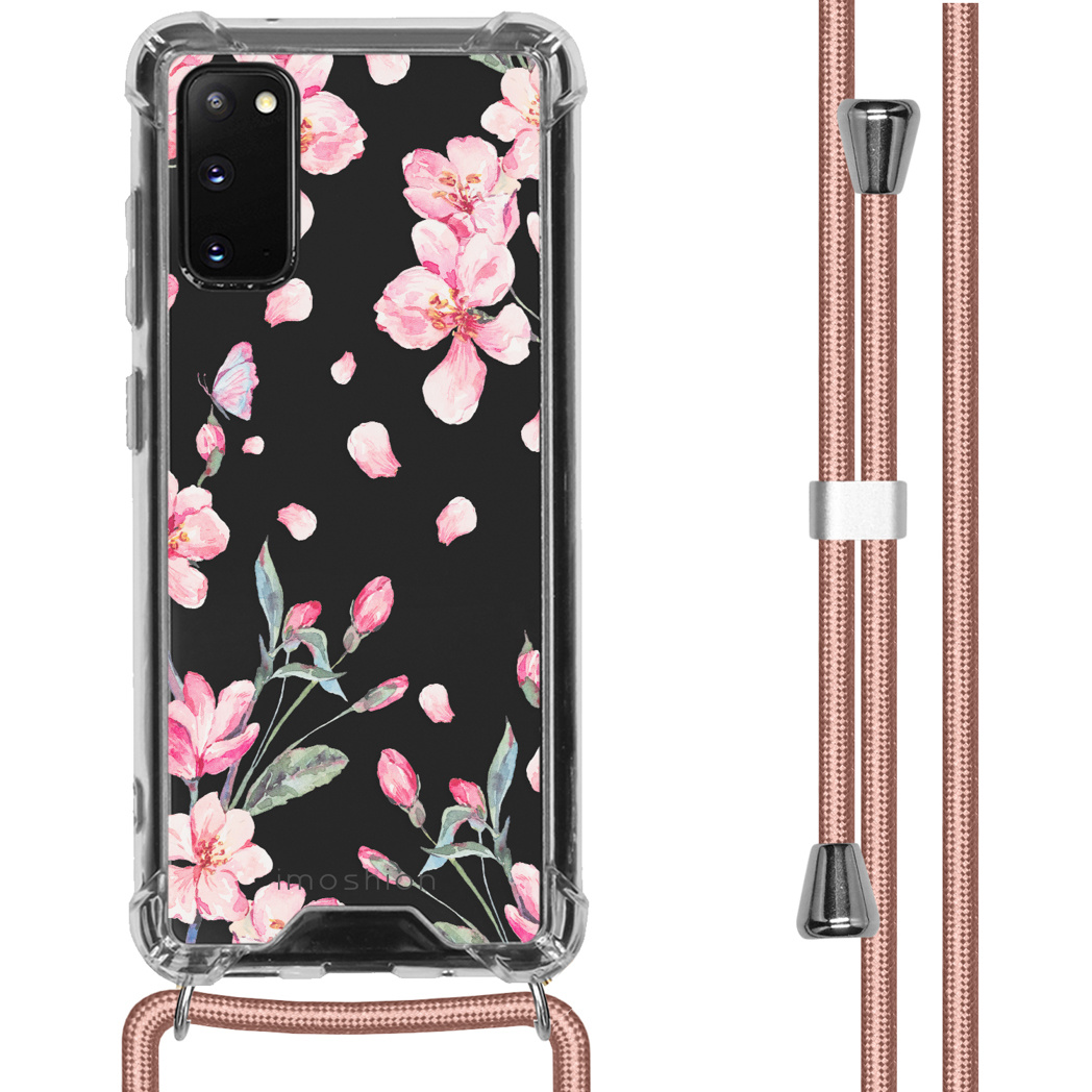 Telefoon met bloemenhoes, roze bloemen op zwarte achtergrond. Roze bandje.