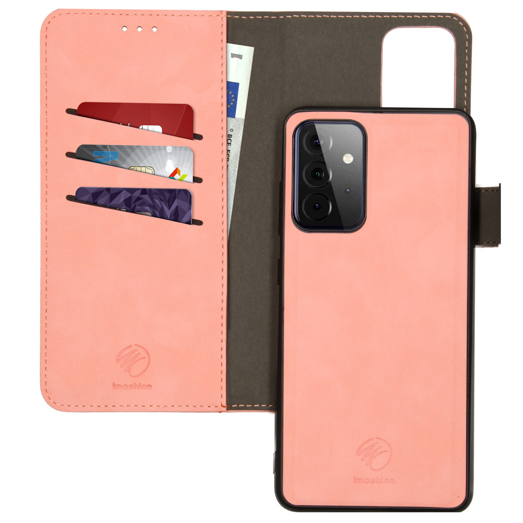 Étui de téléphone rose, ouvert. À l'intérieur, des fentes pour cartes avec cartes et une facture. Un téléphone à droite.