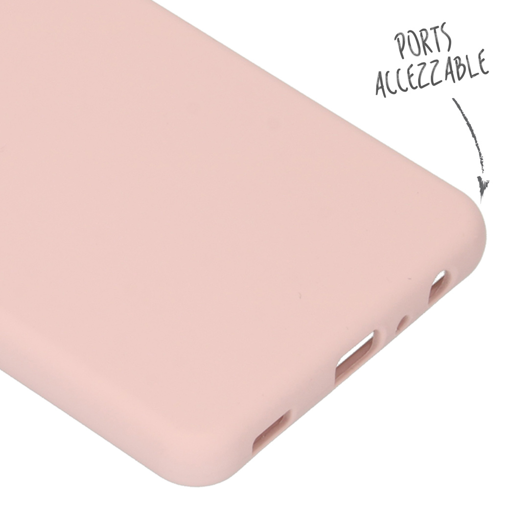 Coin d'étui de téléphone rose. Ports accessibles. Trous pour prise casque, port de charge.