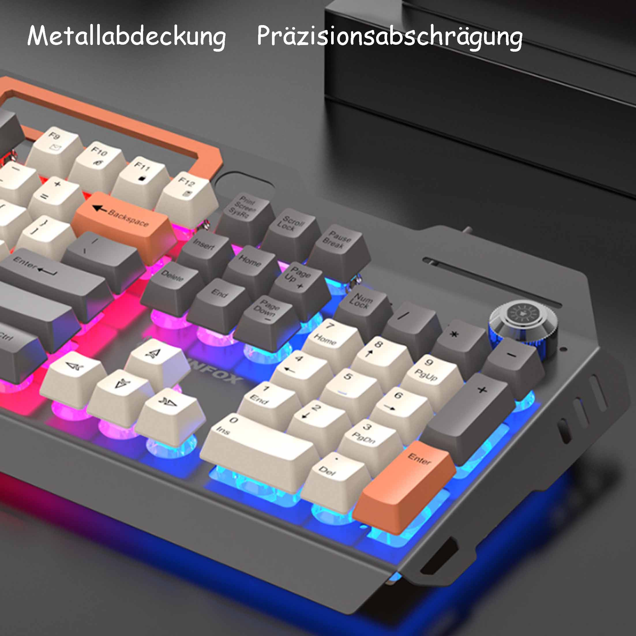 Klawiatura mechaniczna z pomarańczowymi, białymi i jasnoniebieskimi klawiszami. Metalowy korpus.