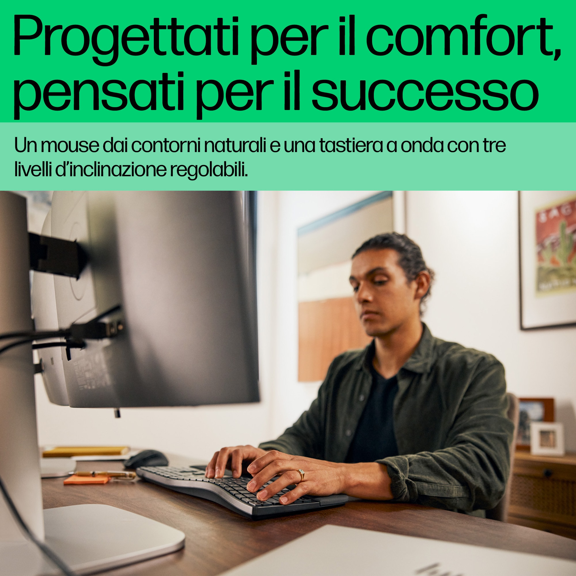 Un uomo usa una tastiera e un mouse. Testi sopra l'immagine: Progettato per il comfort, pensato per il successo.