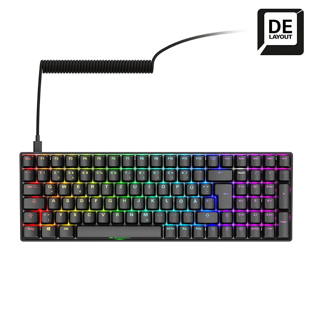 Tastiera da gioco nera con luci multicolore. Ha un layout DE e uno sfondo bianco.