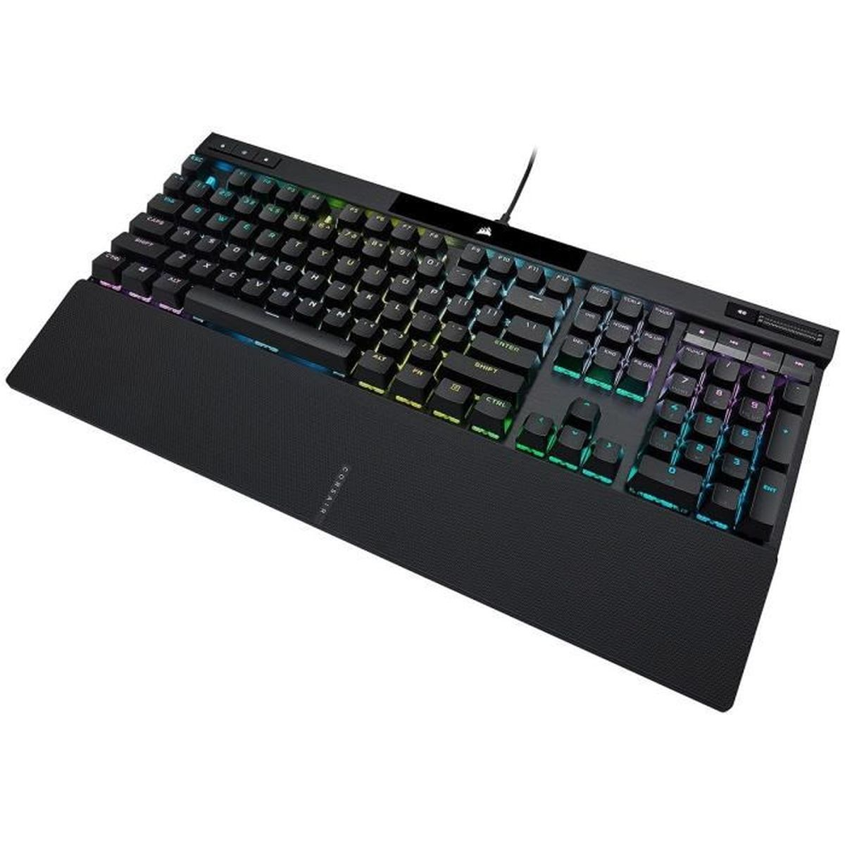 Tastiera Corsair nera con poggiapolsi, tasti illuminati multicolore, su superficie bianca.