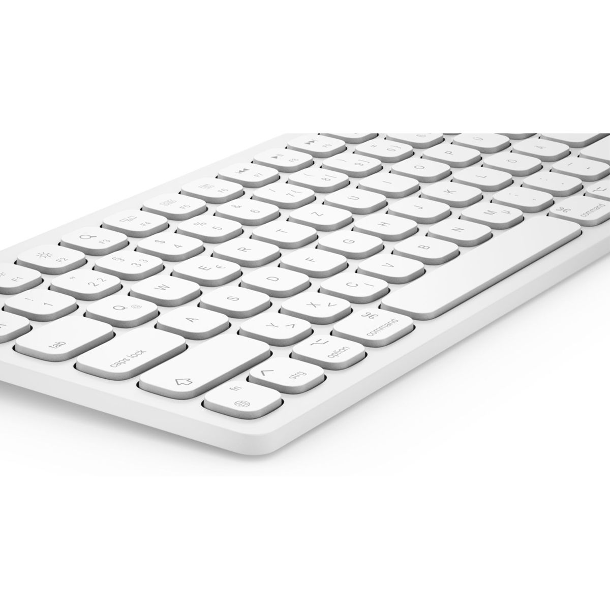 Weiße Tastatur mit weißen Tasten. Flaches Design, saubere Ästhetik.