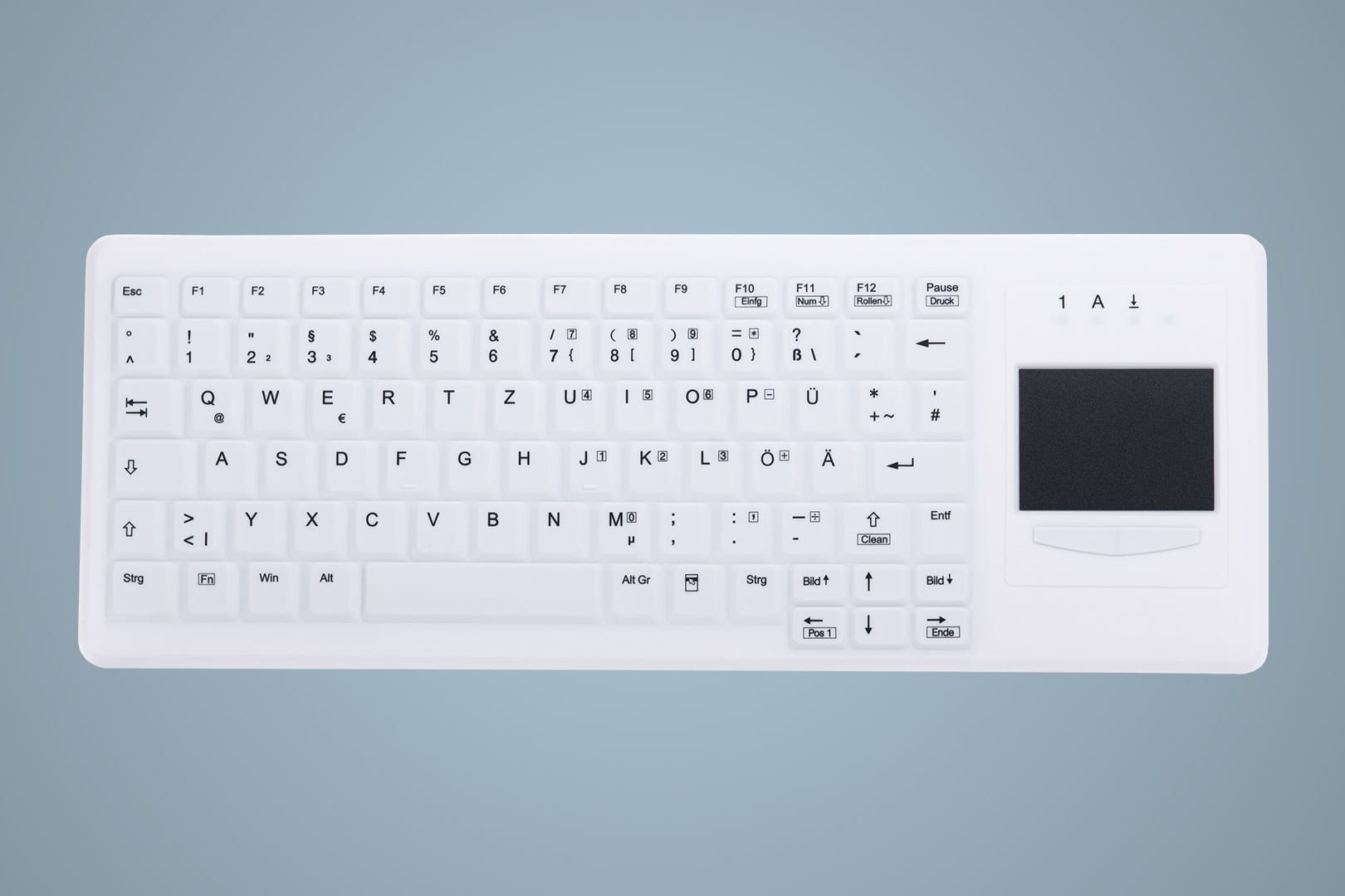 Tastiera bianca con touchpad. I tasti sono bianchi con lettere e simboli neri.