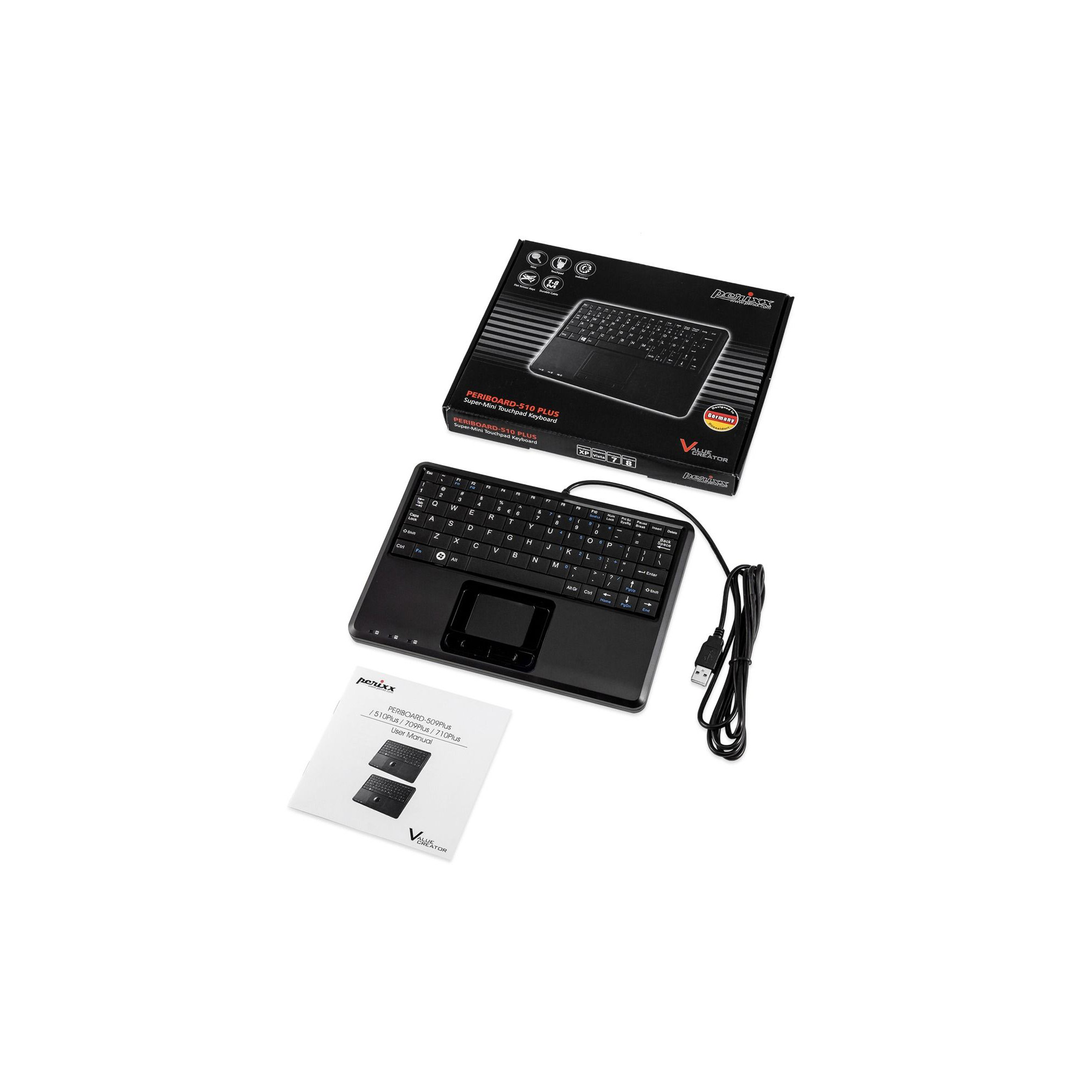 Tastiera nera con touchpad, manuale e scatola. Tutti i componenti su una superficie bianca.