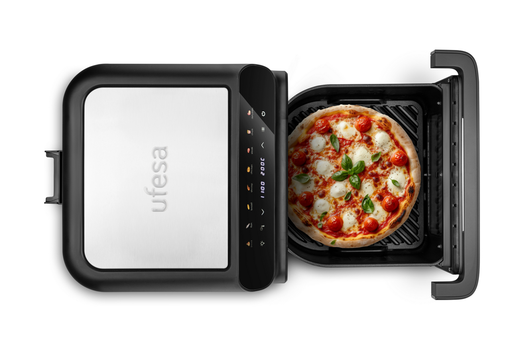 Friggitrice ad aria con pizza dentro. La friggitrice è nera, la pizza ha pomodori e basilico.