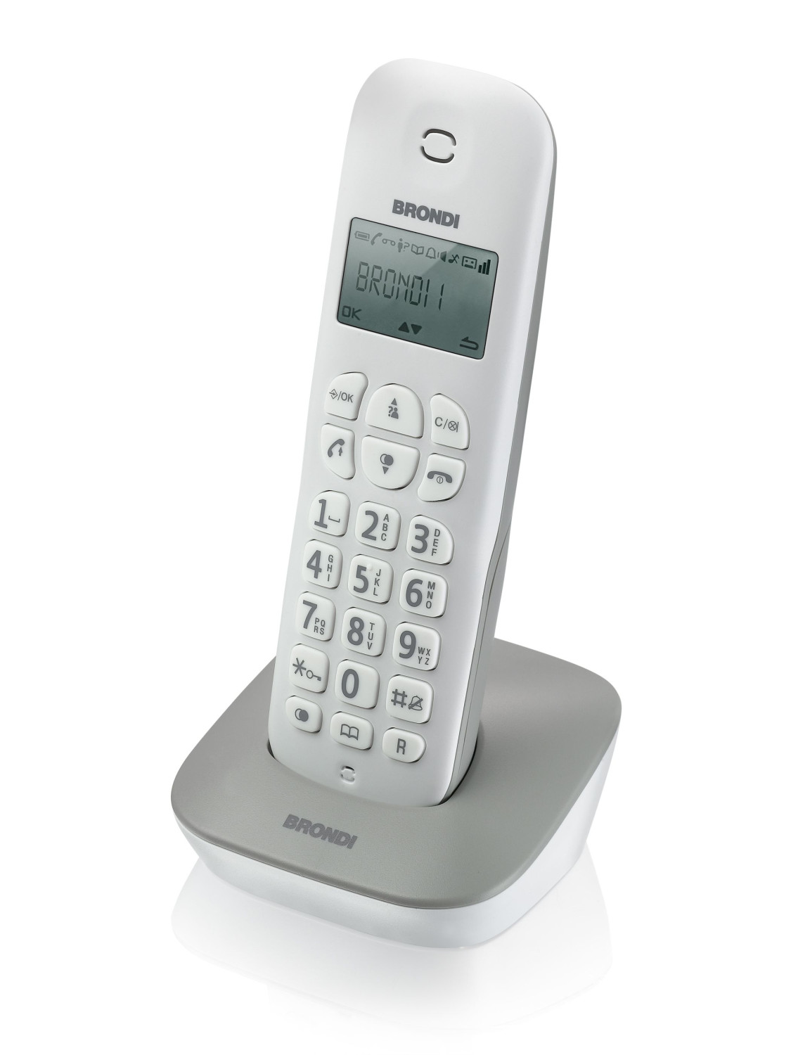 Weißes schnurloses Telefon auf grauem Sockel. Das Display zeigt 'BRONDI' und andere Infos.