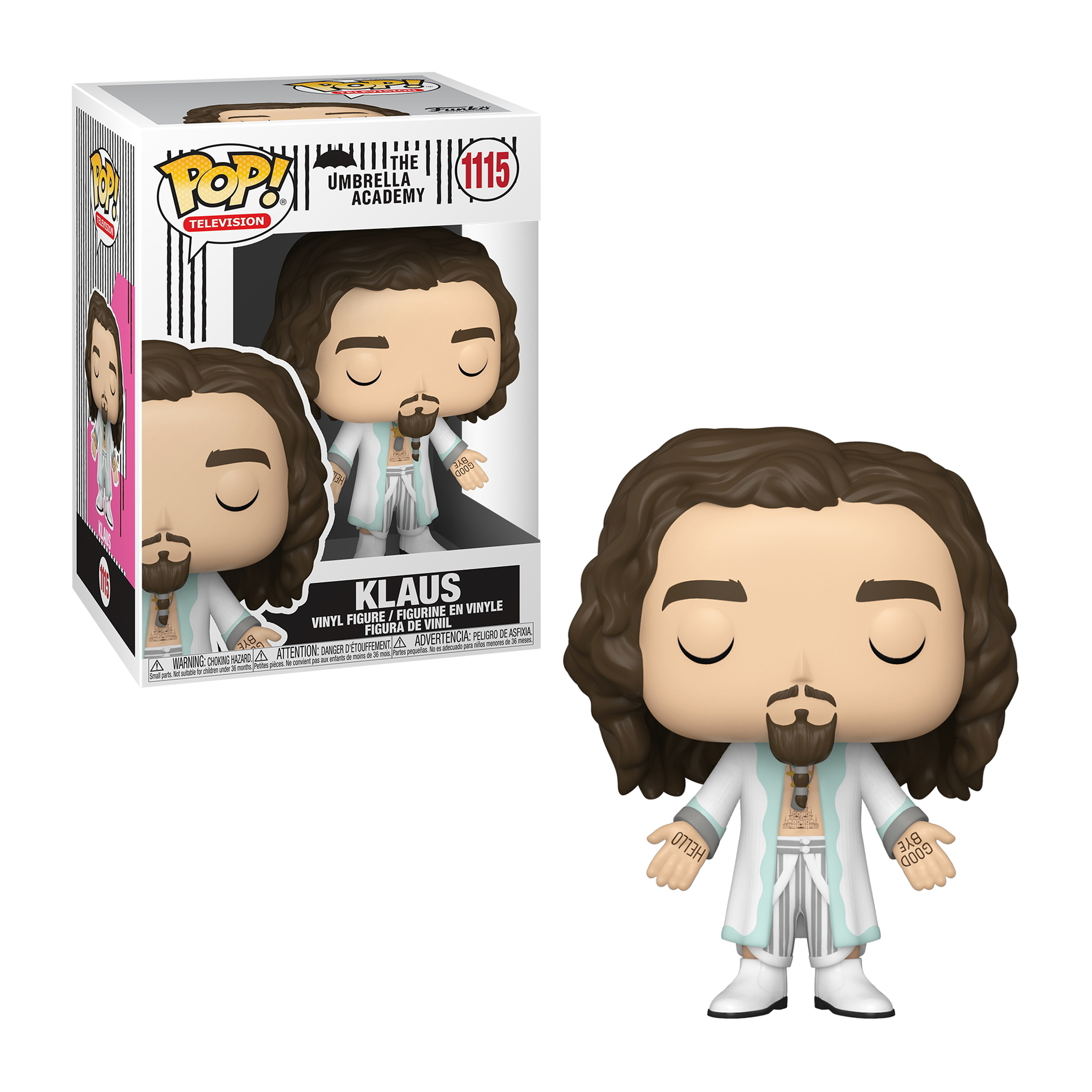 Una statuetta in vinile di Klaus di Umbrella Academy viene mostrata dentro e fuori dalla sua scatola. La figura è in un abito bianco.