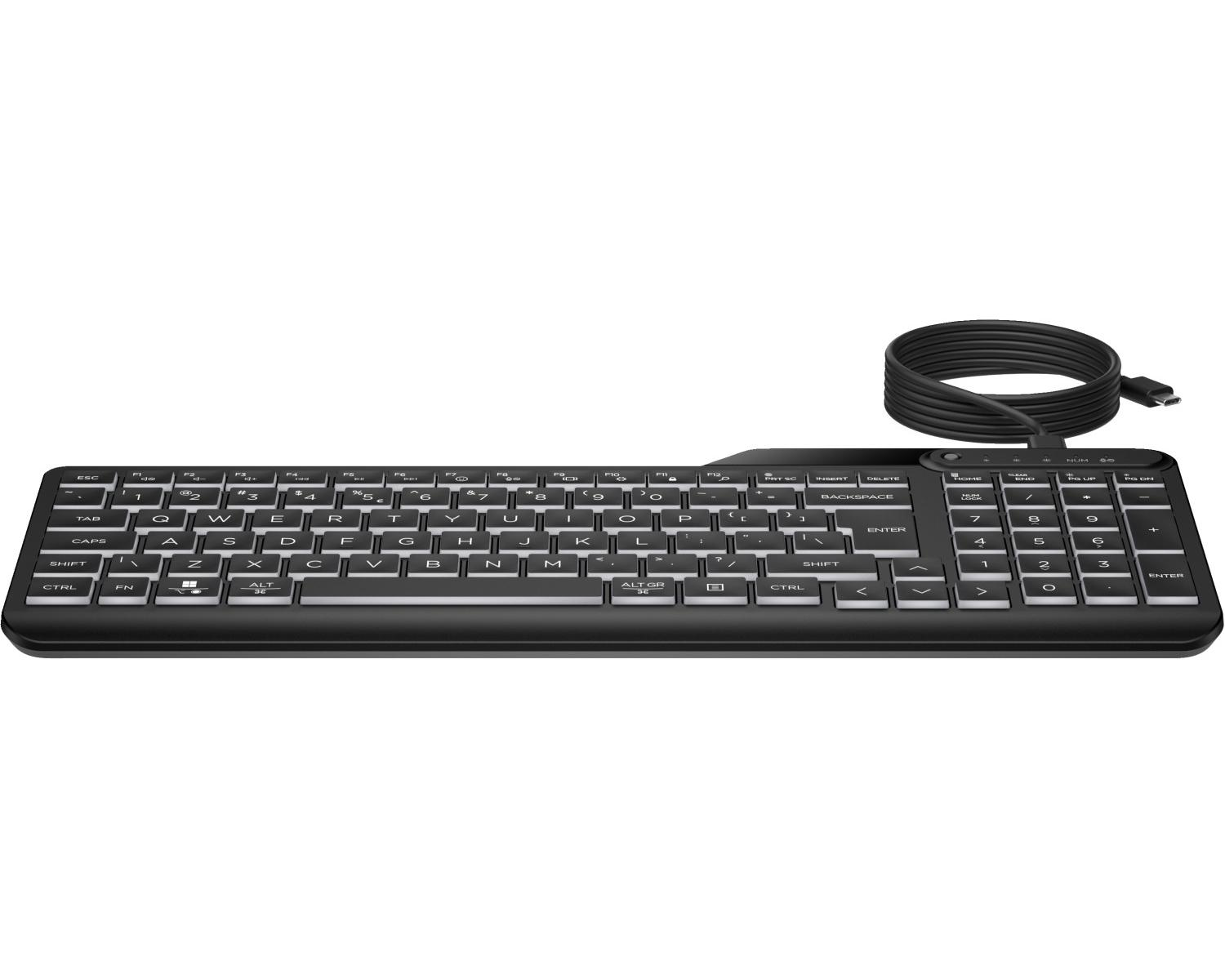 Tastiera nera, con cavo. I tasti sono bianchi, disposti in layout QWERTY.