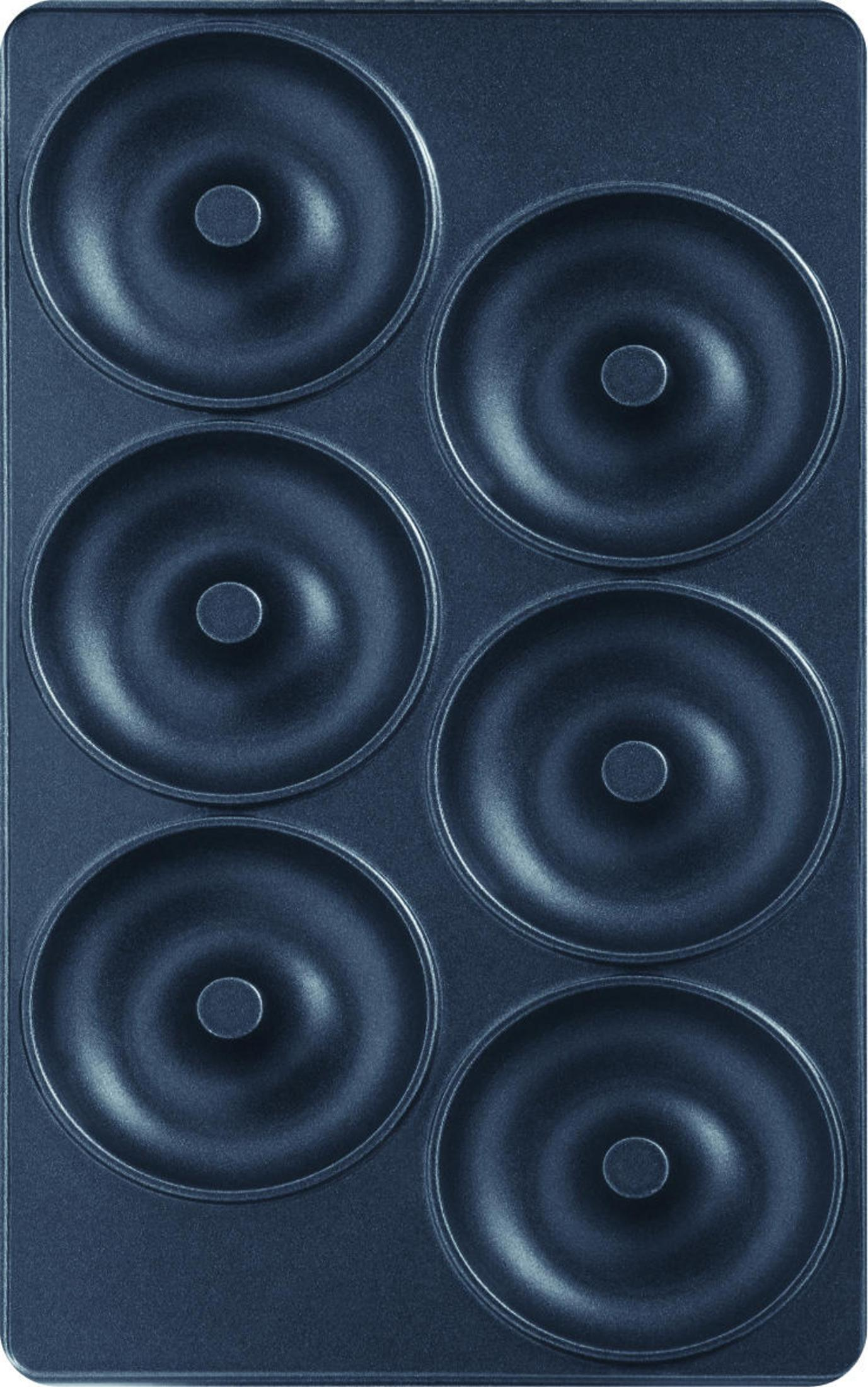 Une plaque à donuts bleu foncé avec six moules à donuts. La plaque est vide.