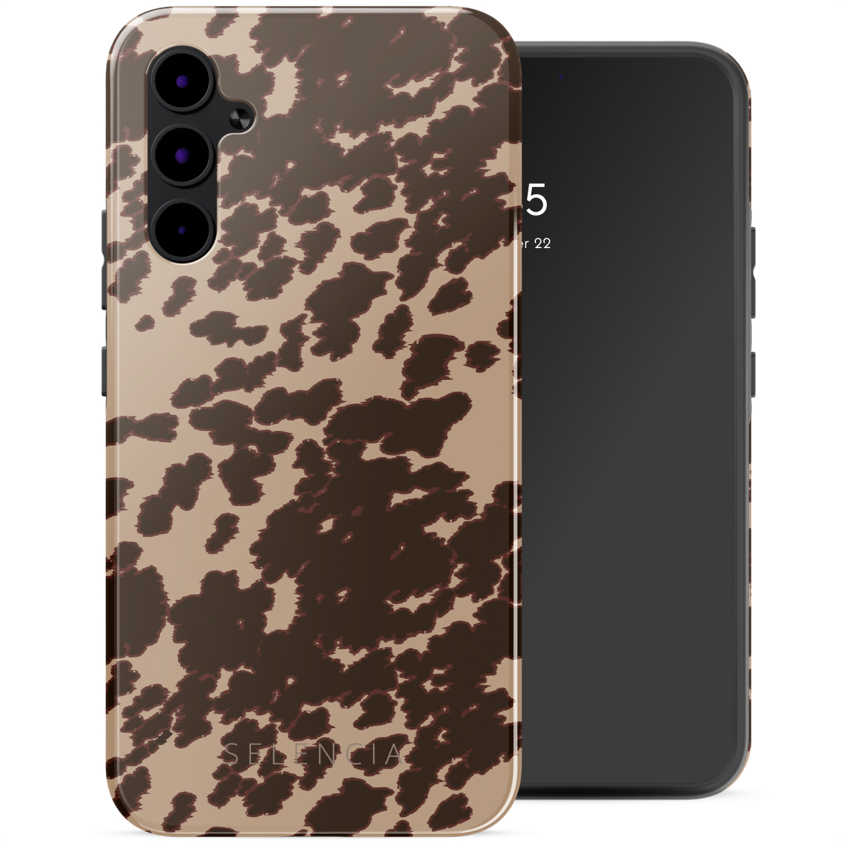 Telefoon in een hoesje met een bruine en bruine koeienprint. Telefoon staat rechts.