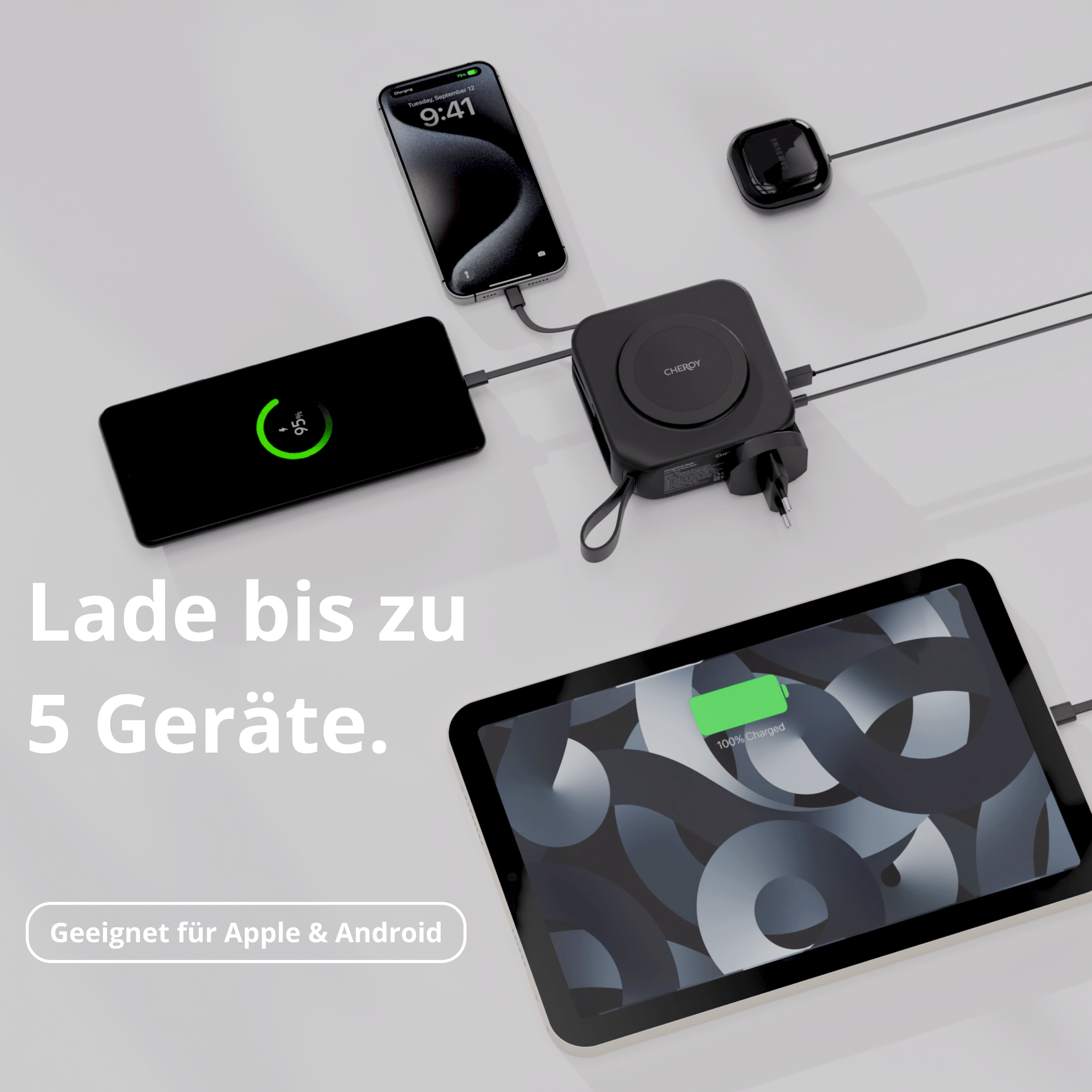 Eine schwarze Ladestation mit mehreren Ladegeräten: Telefon, Tablet und ein kleines schwarzes Gerät.