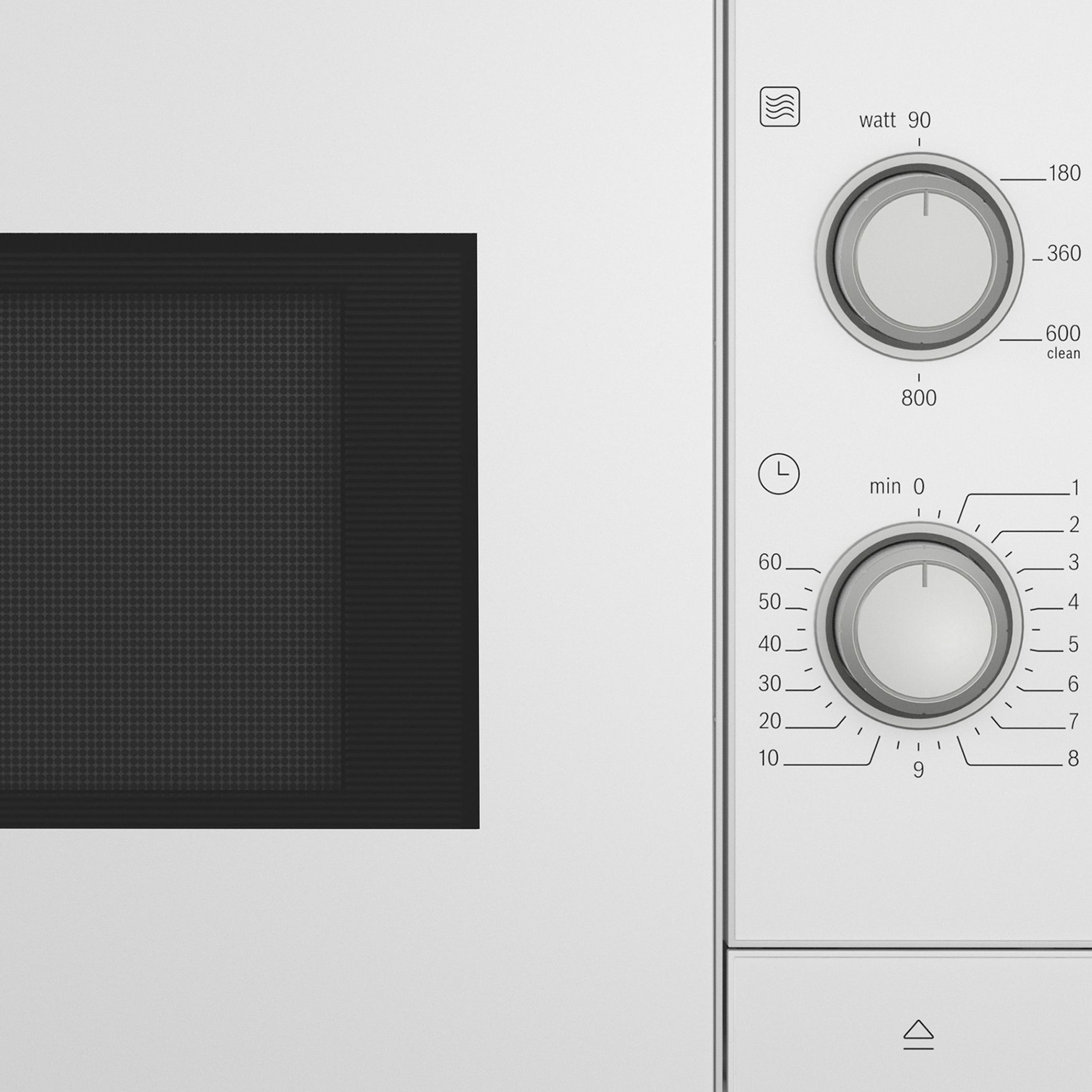 Zbliżenie panelu sterowania białej kuchenki mikrofalowej. Widoczne pokrętła i wyświetlacz.