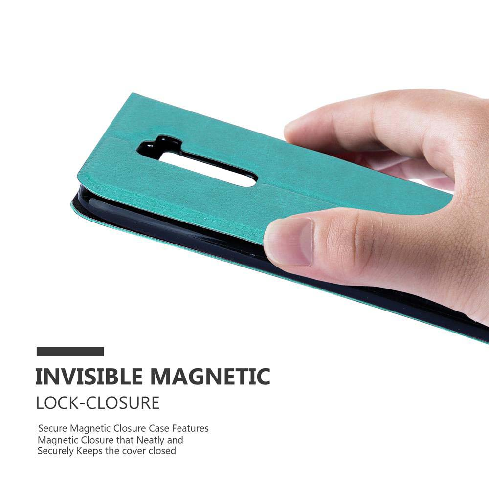 Una mano sosteniendo una funda de teléfono turquesa abierta, revelando un teléfono. Texto: Cierre magnético invisible.