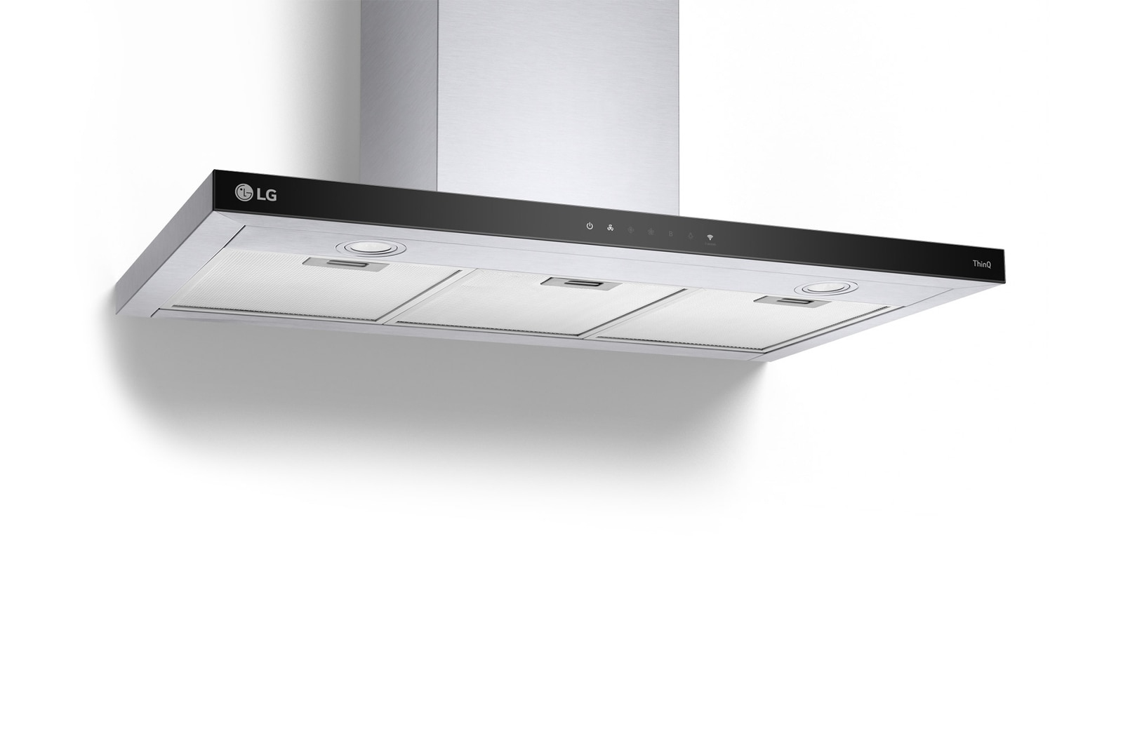 Cappa LG, acciaio inox con frontale nero, appesa a una parete bianca.