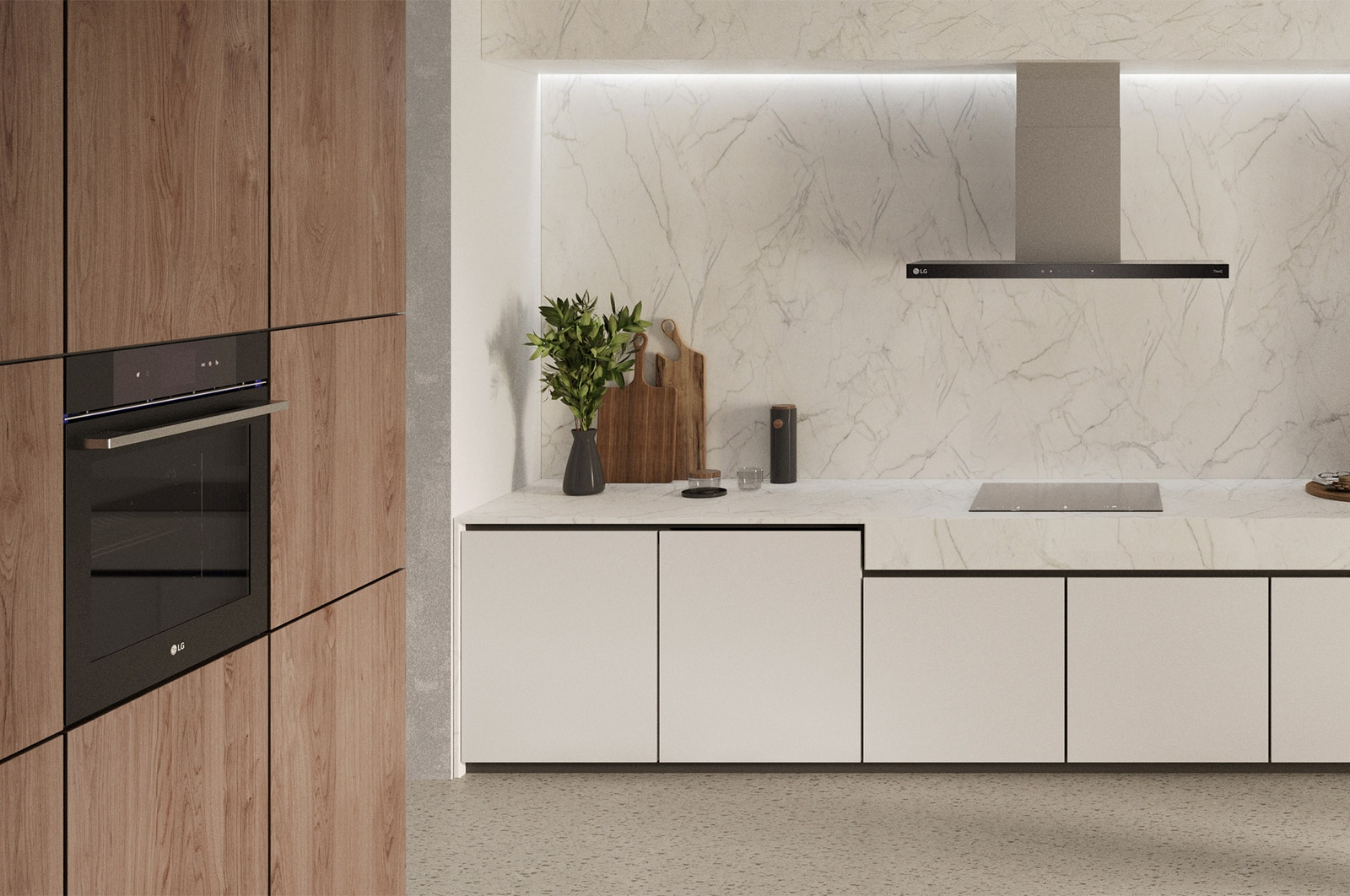 Scena di cucina con mobili in legno, ripiani bianchi e forno nero. Logo LG visibile.