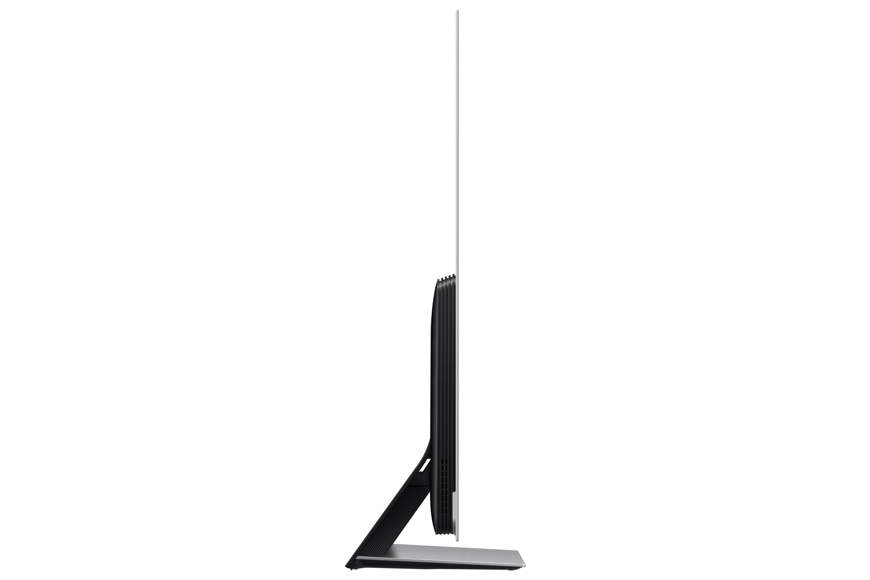 Una vista laterale di un sottile TV OLED nero su un supporto argentato contro uno sfondo bianco.