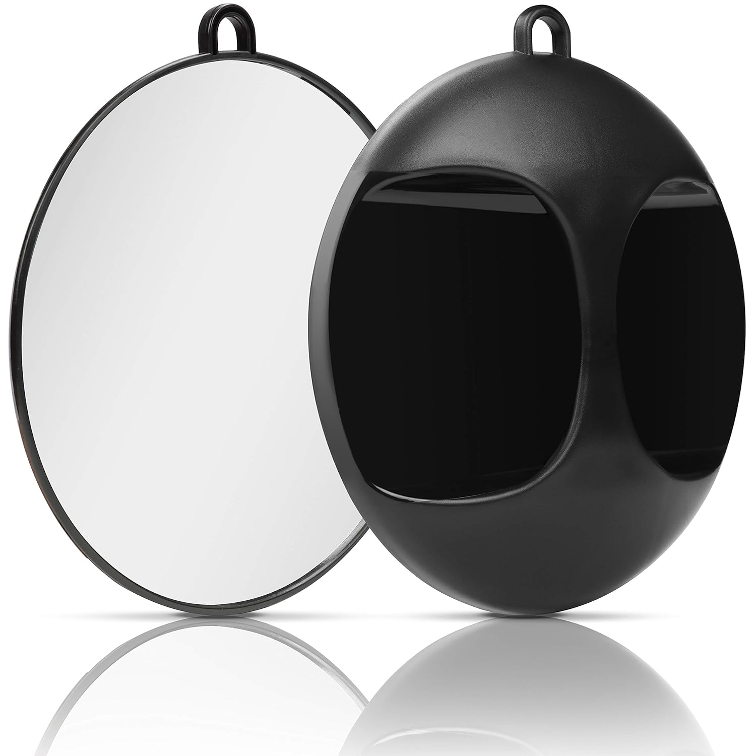 Zwei runde Reflektoren, einer ist eine reflektierende Oberfläche, der andere ist schwarz.