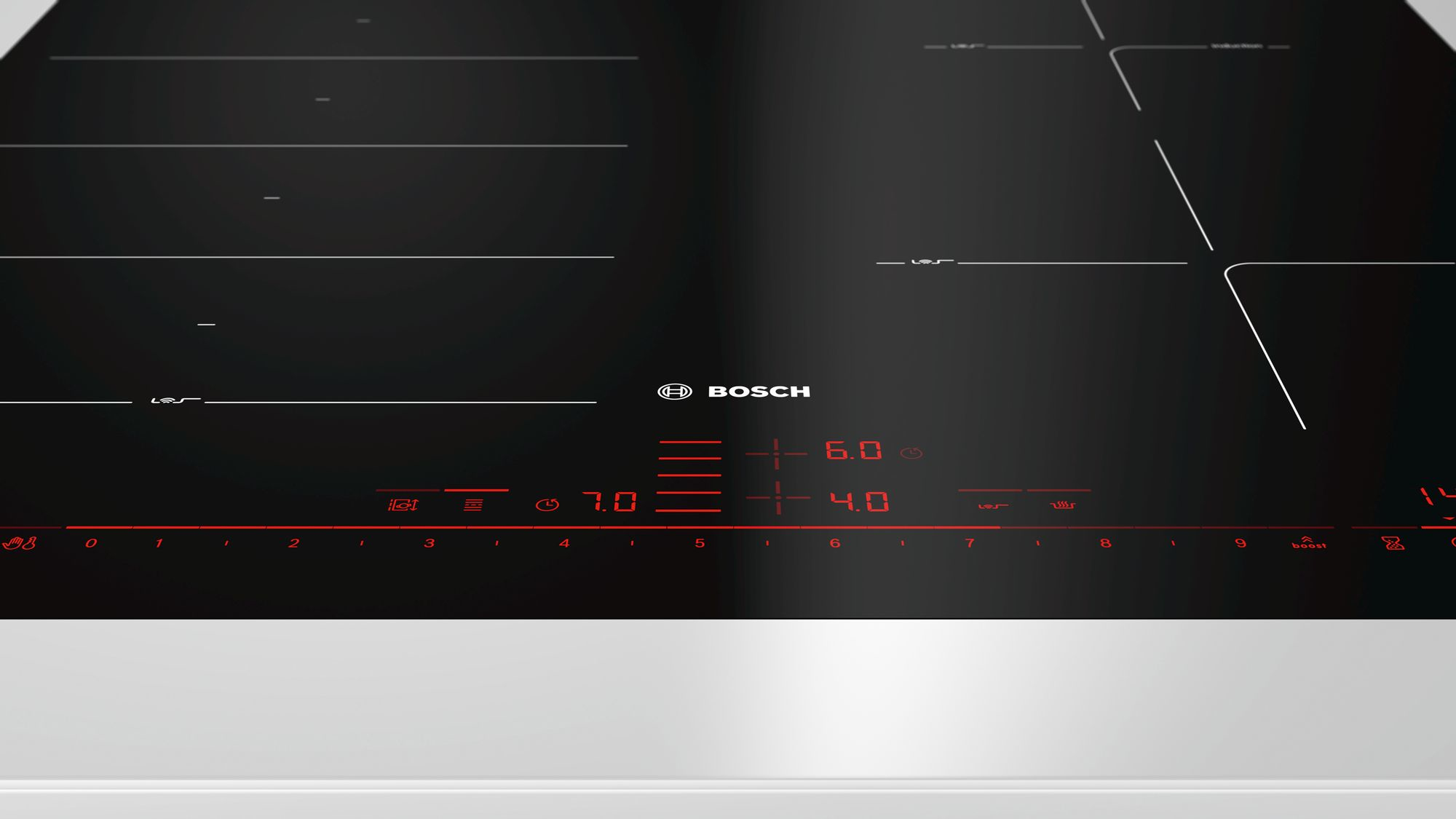Czarna płyta grzewcza z czerwonym wyświetlaczem cyfrowym, widok z góry.