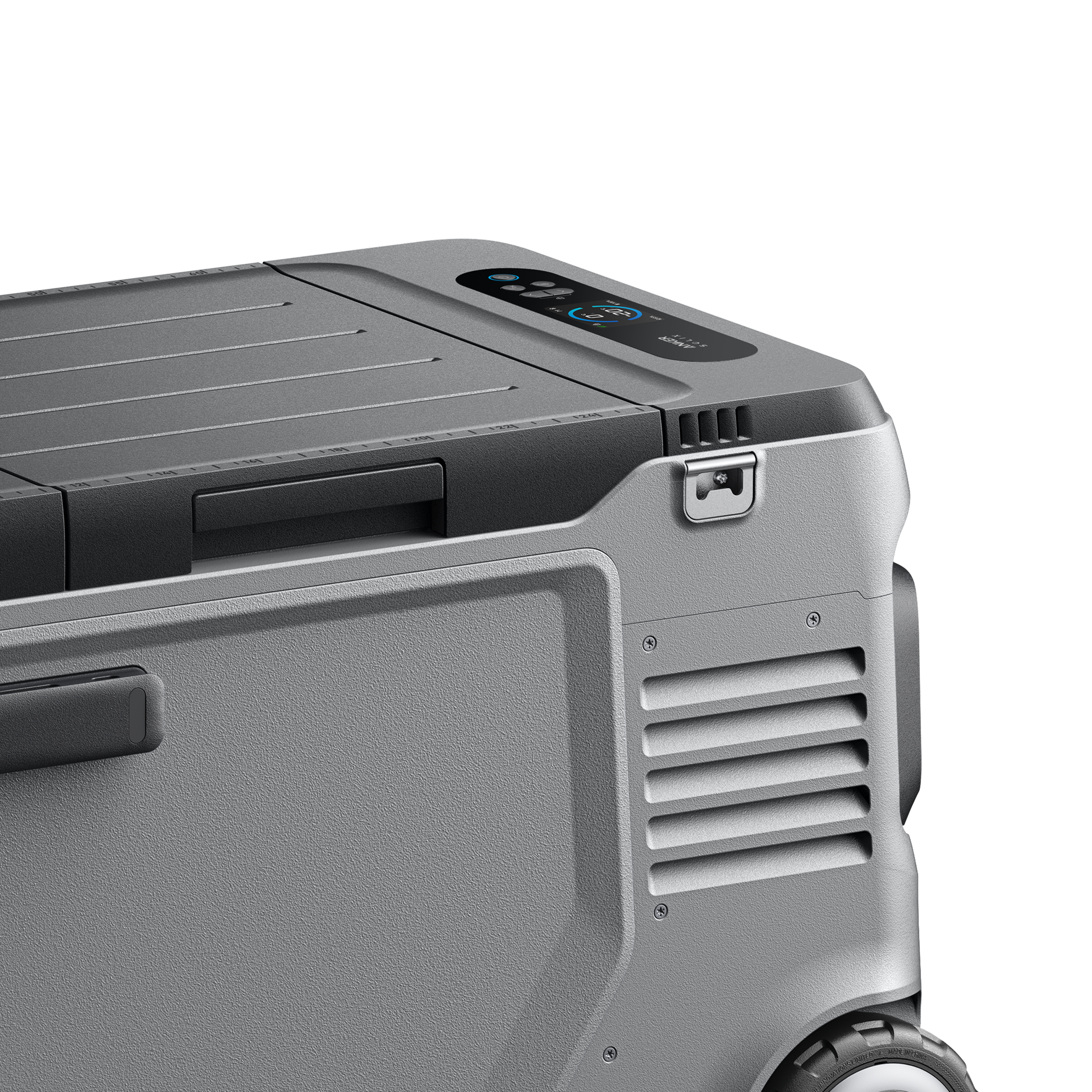 Szara chłodziarka. Chłodziarka jest głównie szara z czarną górą. Ma cyfrowy wyświetlacz i kółka.