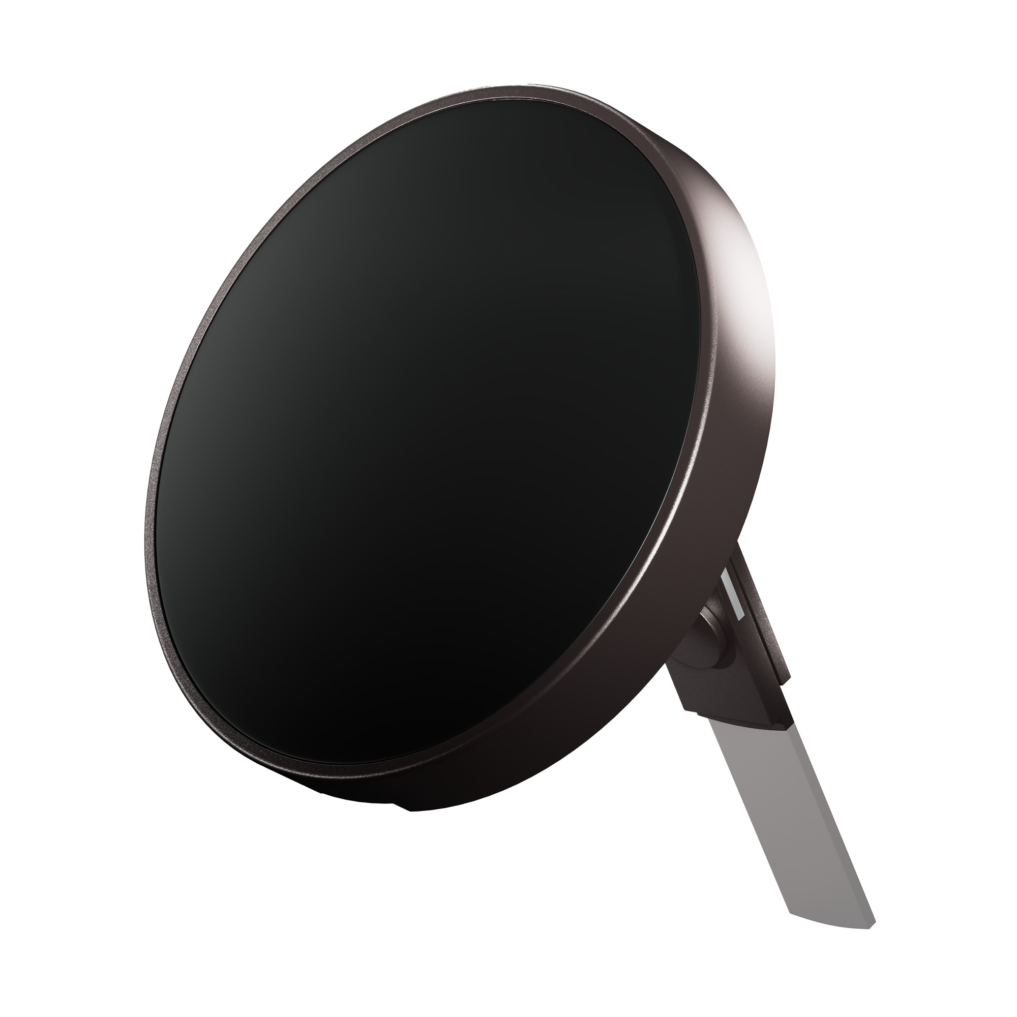 Okrągły, czarny magnetyczny uchwyt samochodowy na telefon, pochylony w górę.