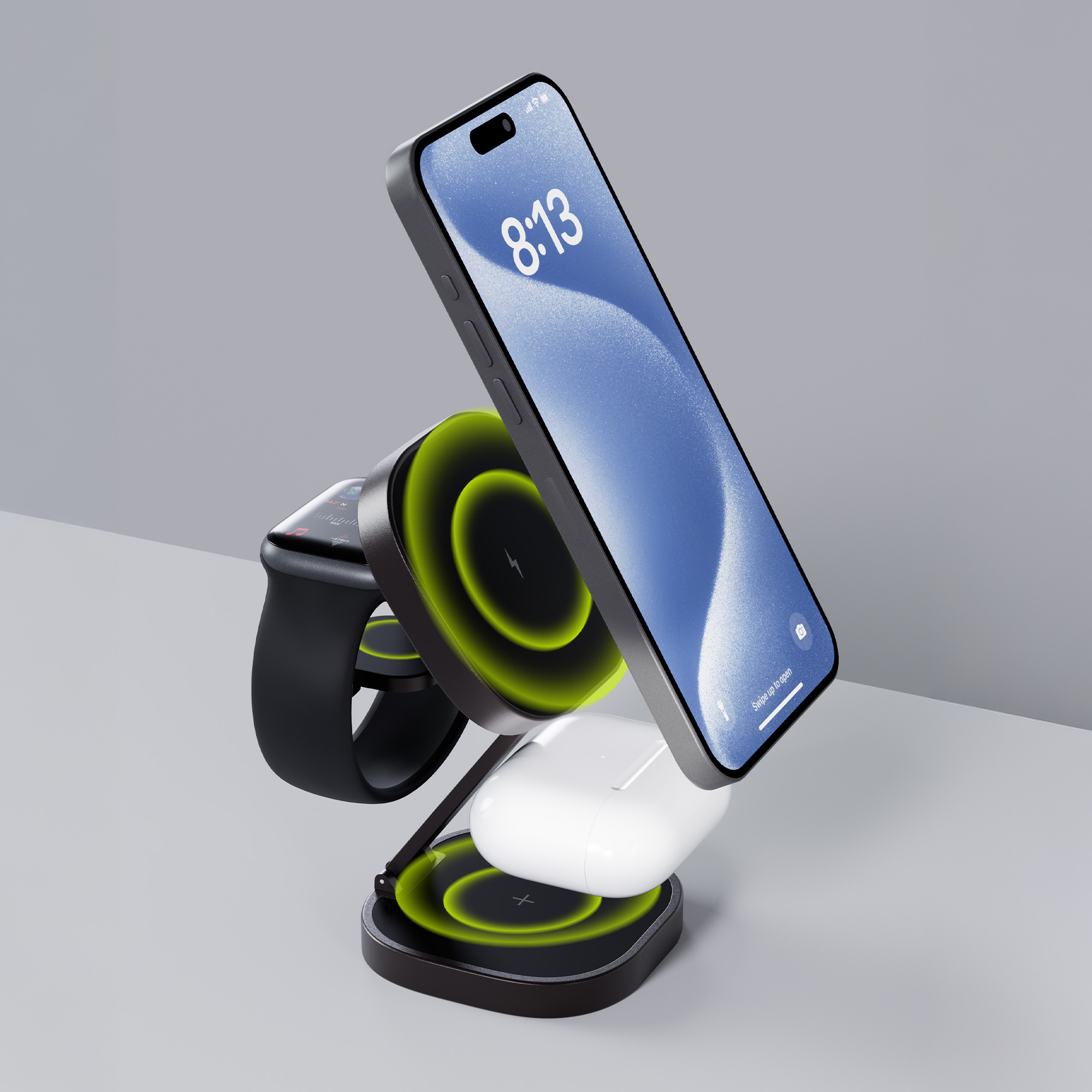 Telefon, zegarek i słuchawki ładujące się na stojaku. Widoczne zielone światła ładowania.