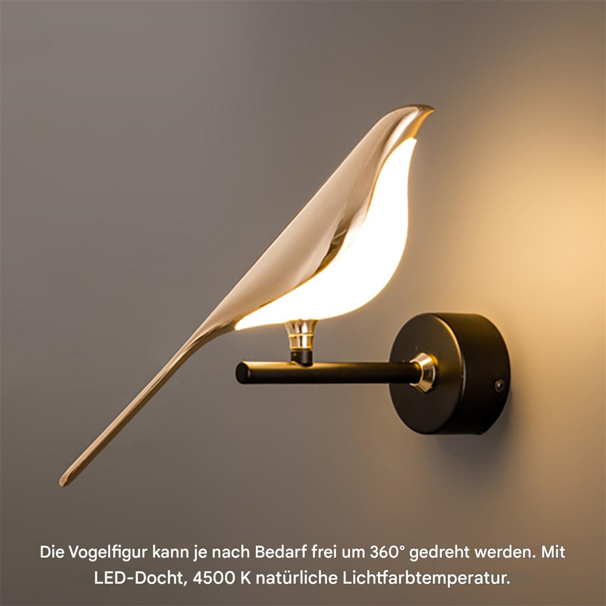 Eine vogelförmige Wandlampe. Gold-Finish, schwarzer Träger. Beleuchtet.