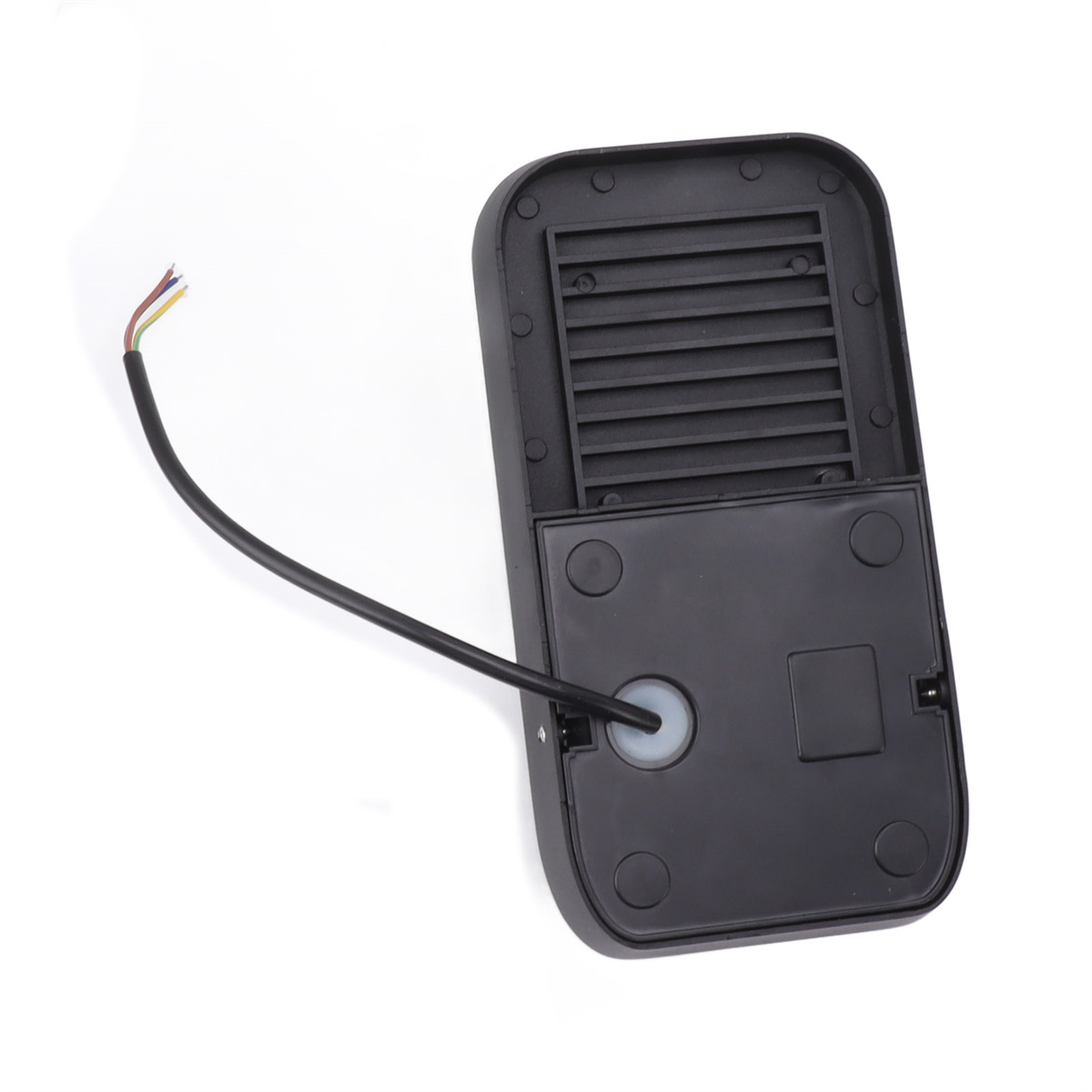 Schwarze Kunststoff-Leuchte, Kabel verlängern sich. Draufsicht auf weißem Hintergrund.