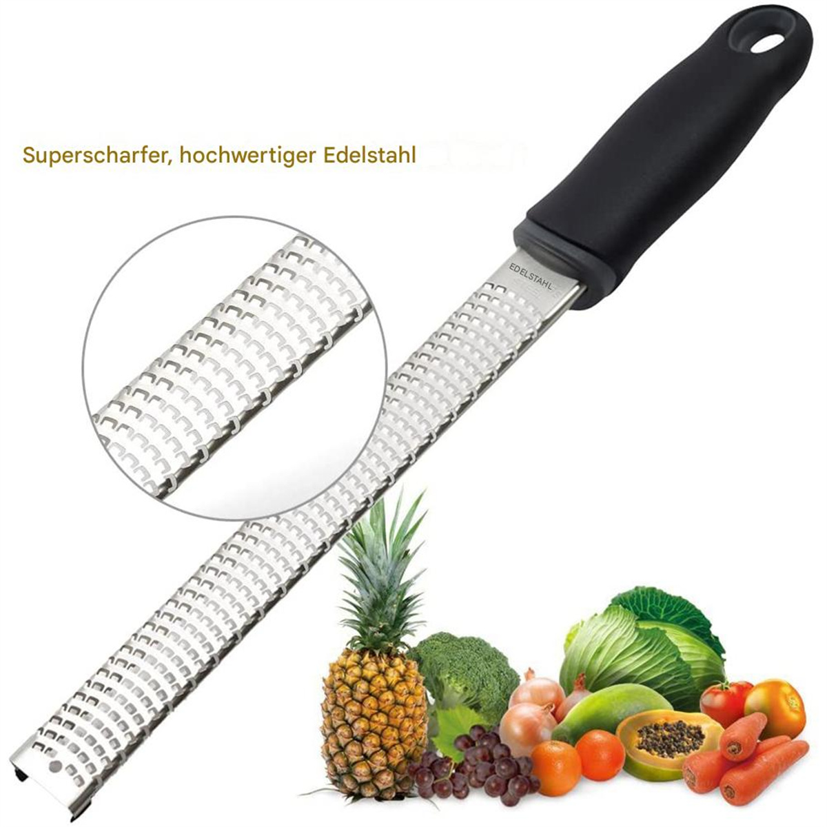 Edelstahlreibe mit Gemüse und Früchten.