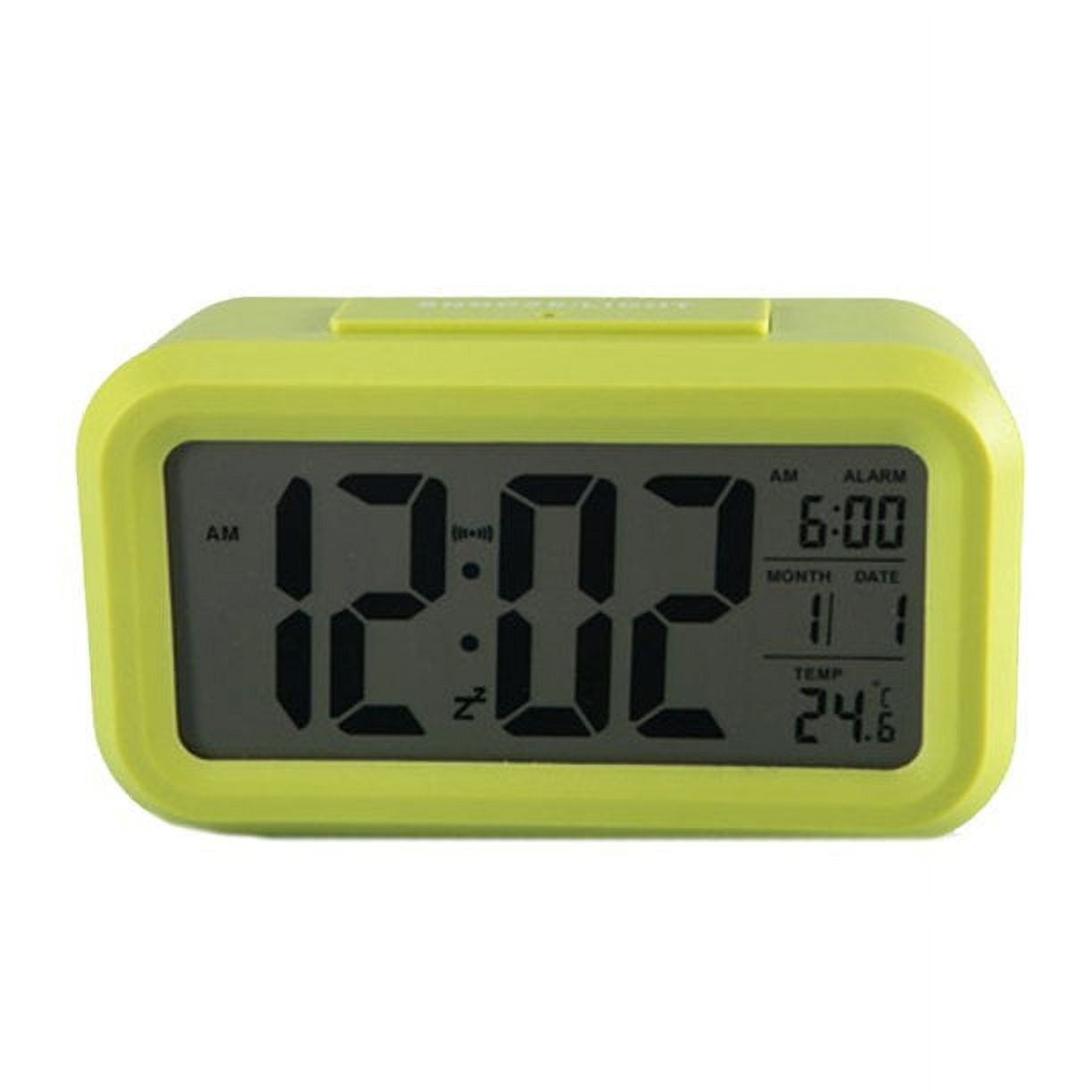 Ein hellgrüner digitaler Wecker mit 12:02 und 6:00 Uhr AM, Datum 11/1.