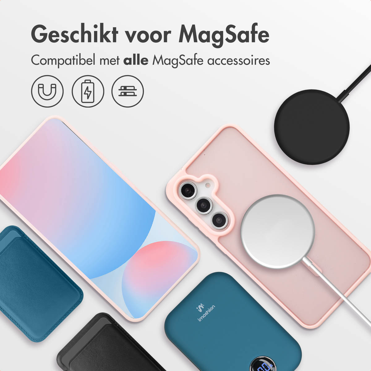 Téléphone rose, chargeur noir, accessoires bleus.