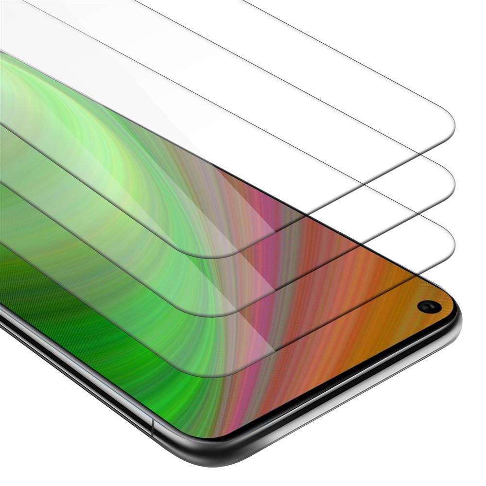 L'immagine mostra tre protezioni per schermo trasparenti su uno schermo del telefono che mostra arte astratta colorata.