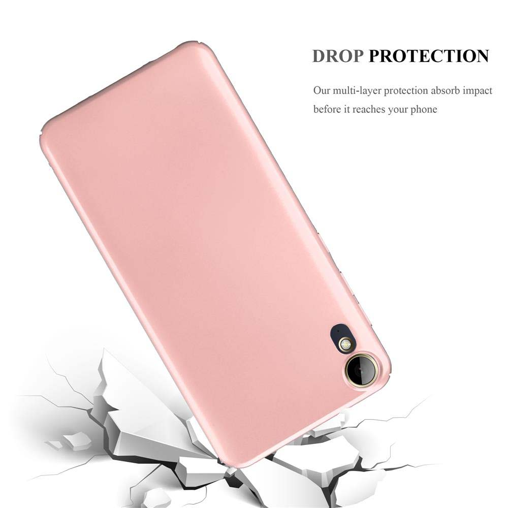 Funda rosa para teléfono en suelo agrietado. Texto: Drop Protection. Fondo blanco.
