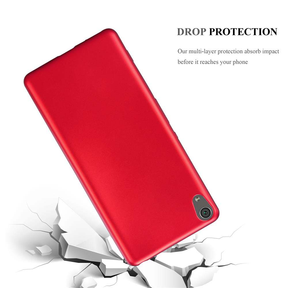 Funda de teléfono roja cayendo sobre suelo agrietado. La funda es roja y el suelo blanco con grietas.
