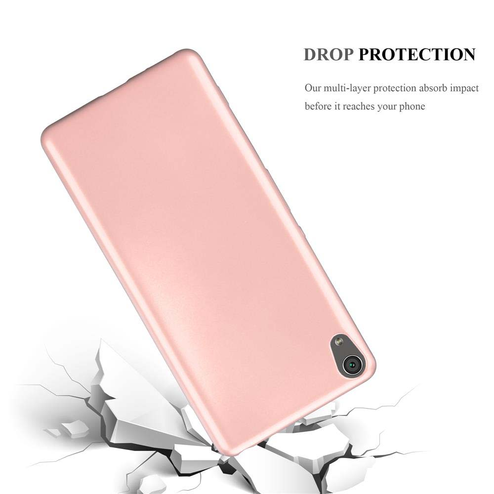 Una funda rosa para teléfono se coloca sobre una superficie blanca, con grietas que indican un efecto de protección contra caídas.