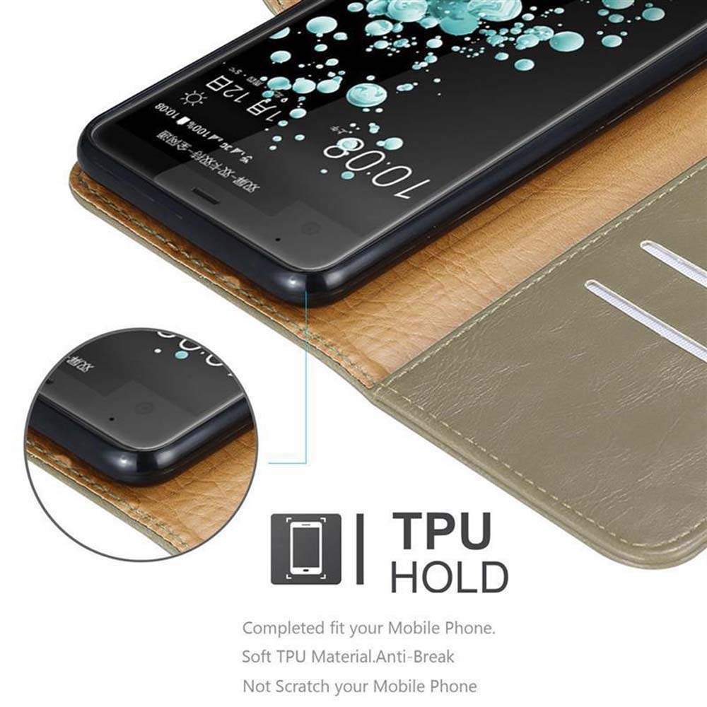 Un telefono in una custodia marrone. Lo schermo mostra uno sfondo di forme astratte bianche e blu.