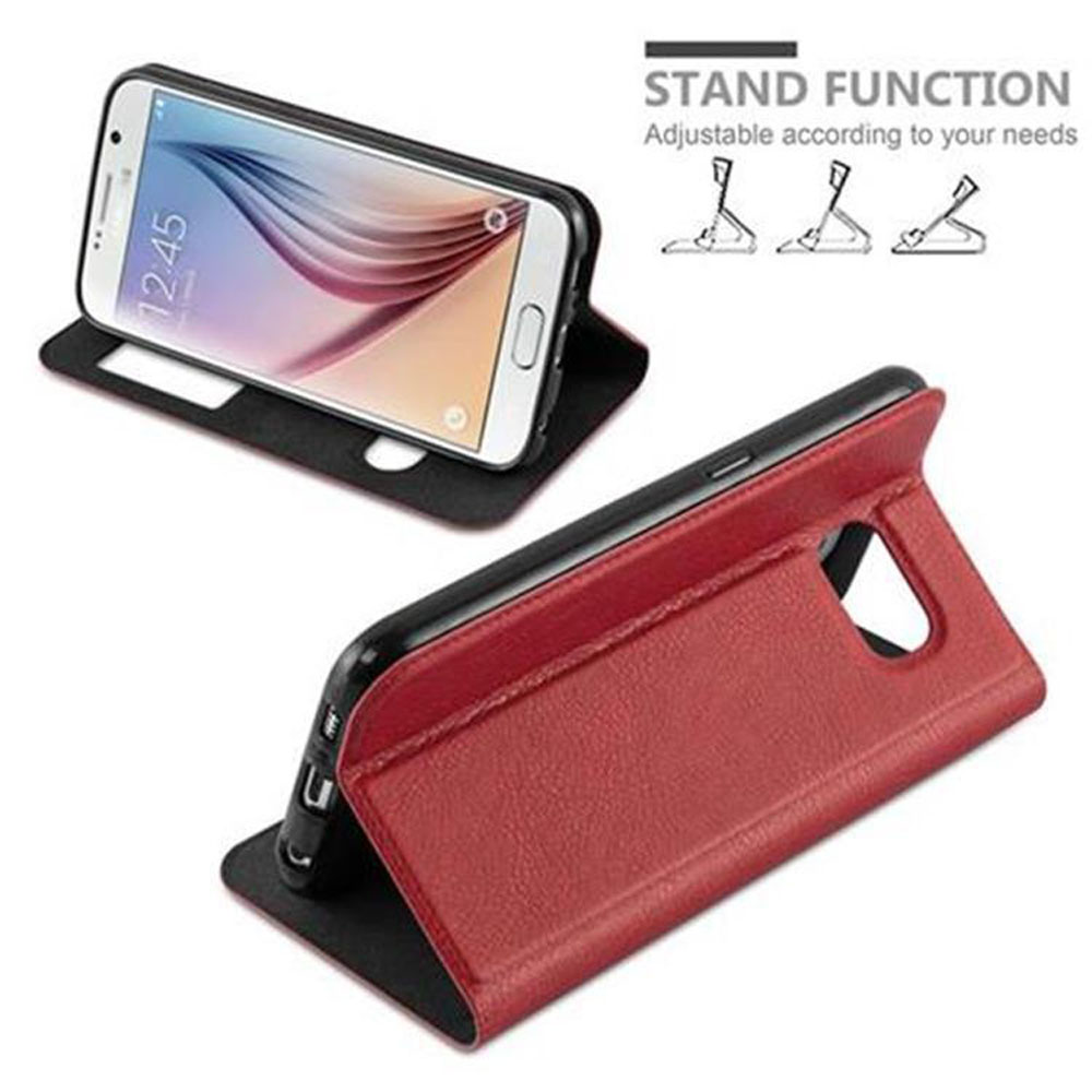 Custodia per telefono rossa in posizione stand, con telefono. Grafica funzione stand presente. Sfondo bianco.