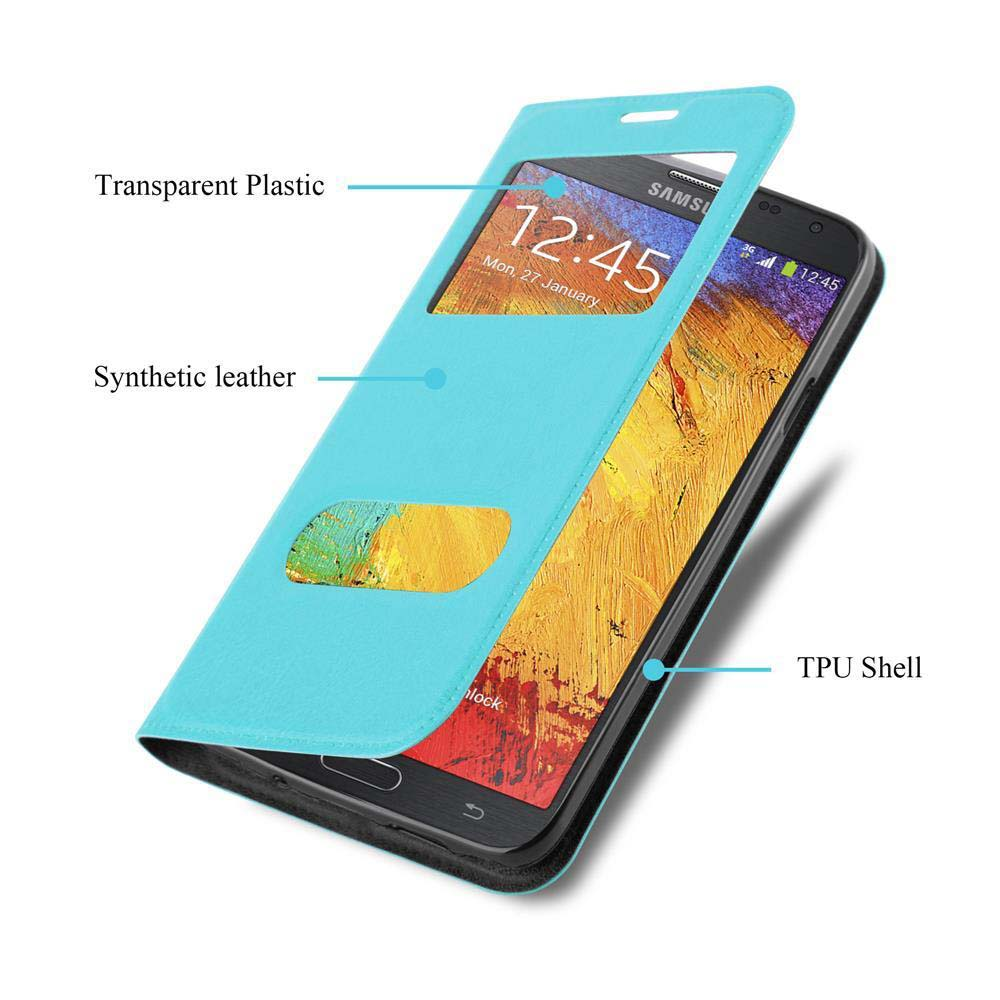 Teléfono en una funda azul con una cubierta transparente. Texto: Plástico transparente, cuero sintético, carcasa de TPU.