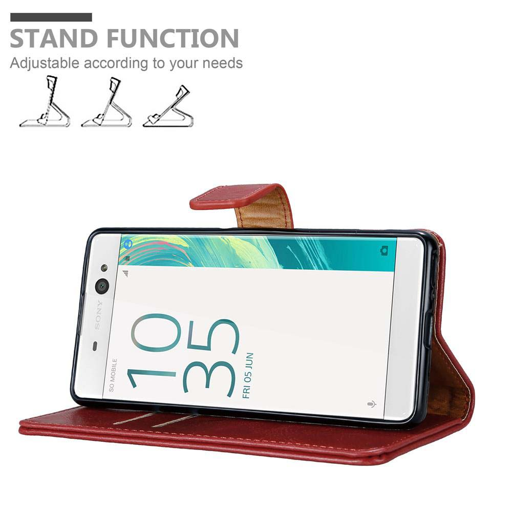 Funda de teléfono roja con teléfono mostrando la hora. Texto y diagramas de función de soporte en el fondo.