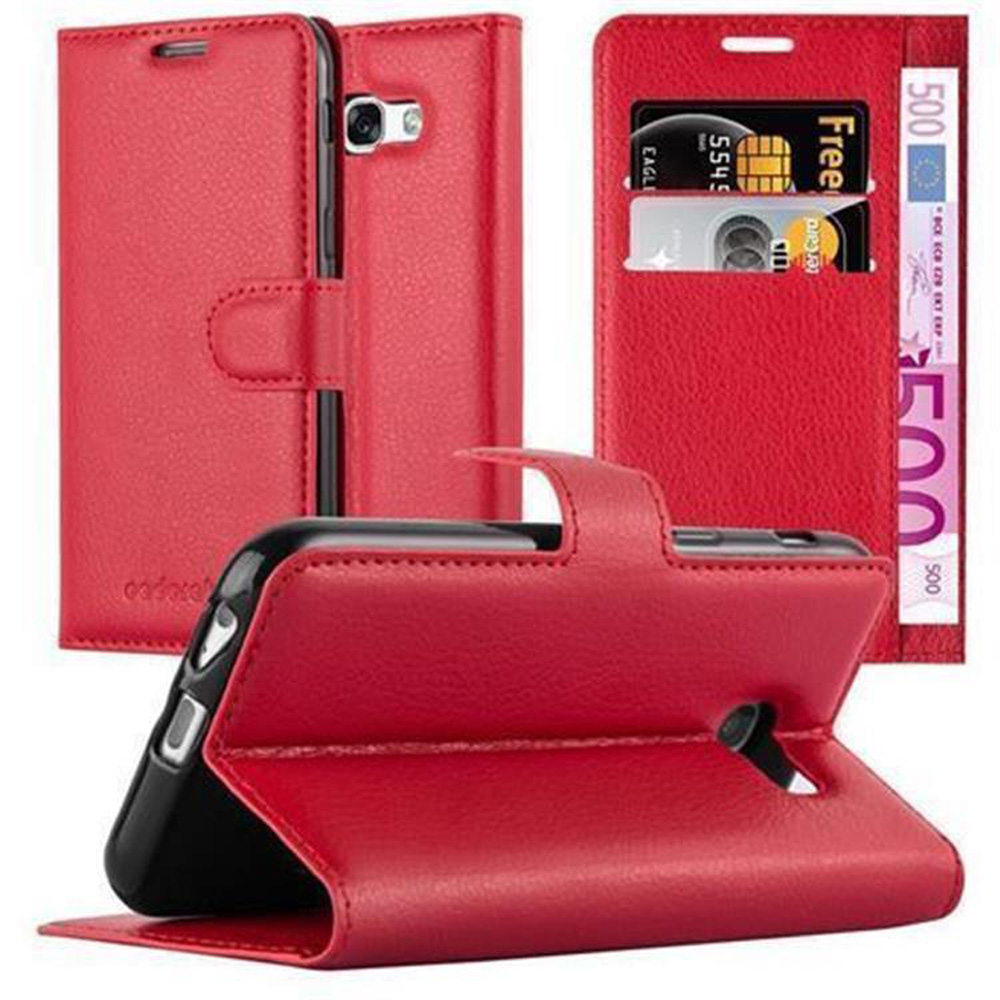 Rote Handyhülle mit Karten und Geld. Telefon ist in der Hülle. Alles ist rot.