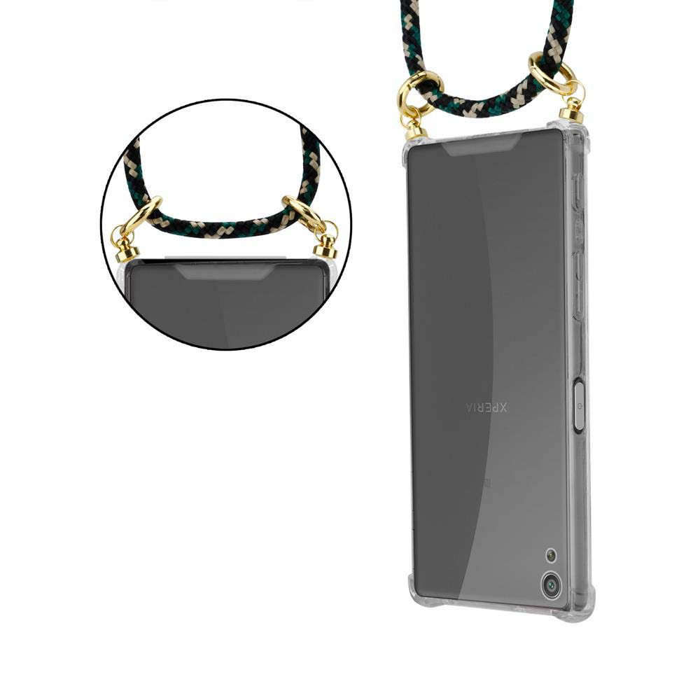 Eine transparente Handyhülle mit angebrachtem Kabel. Die Hülle umgibt ein Telefon mit Kamera.