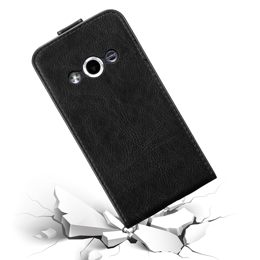 Custodia nera che cade su cemento bianco rotto. Testo: Drop Protection.