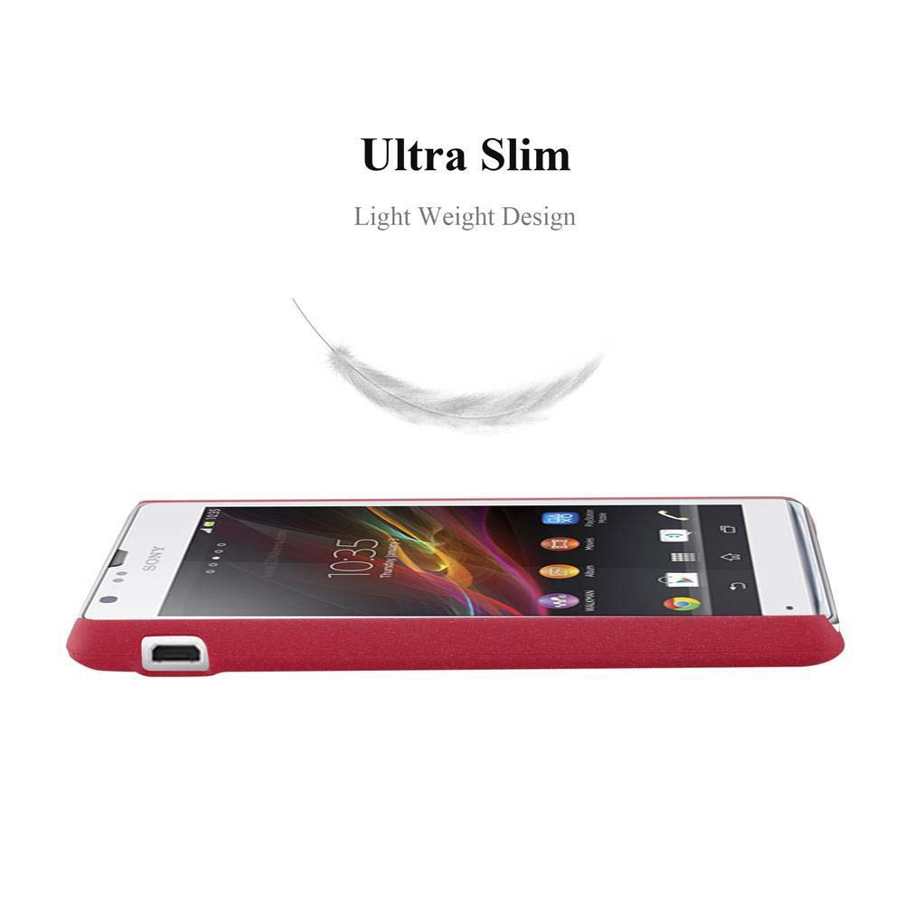 Teléfono rojo en una funda, vista frontal. Gráfico de pluma arriba, teléfono en superficie blanca.