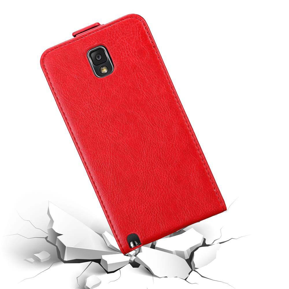 Custodia per telefono rossa su una superficie bianca. La custodia cade e mostra il telefono.