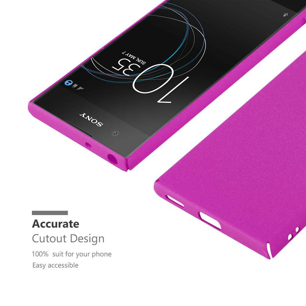 Custodia rosa per telefono accanto a un telefono. Il telefono mostra data e ora.